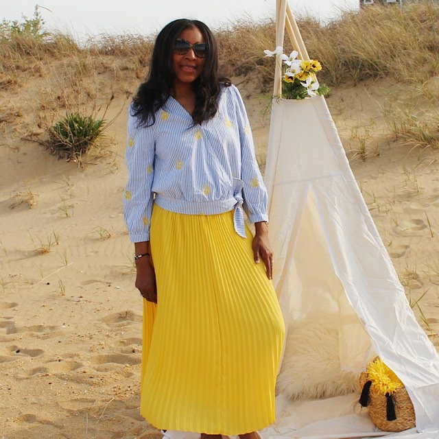 Yellow pleated skirt wrap blouse 